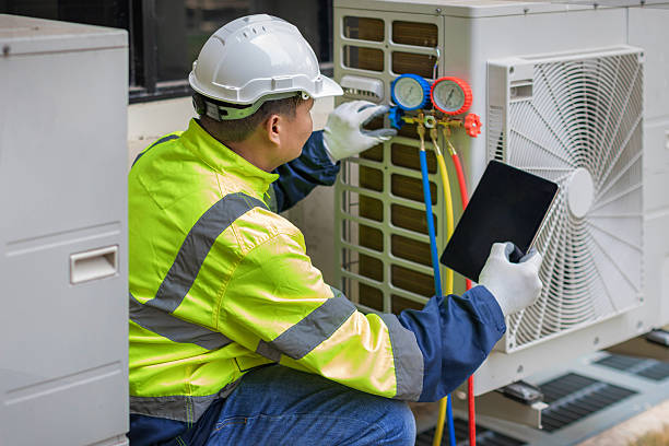 Professional Air Conditioning Repair technician working in Malden, MA